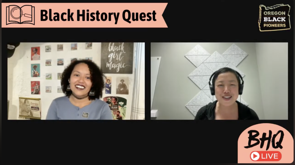 Two women participate in a virtual event called Black History Quest, hosted by Oregon Black Pioneers, with visible posters and a headset. The Quest Continues as they explore history and culture together.